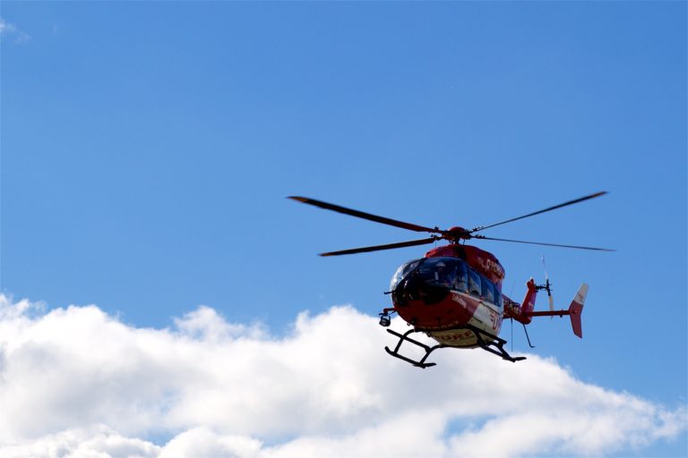 Helicopter emergency flight with blue sky in the background